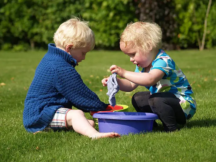two toddlers playing