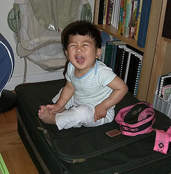 baby on suitcase