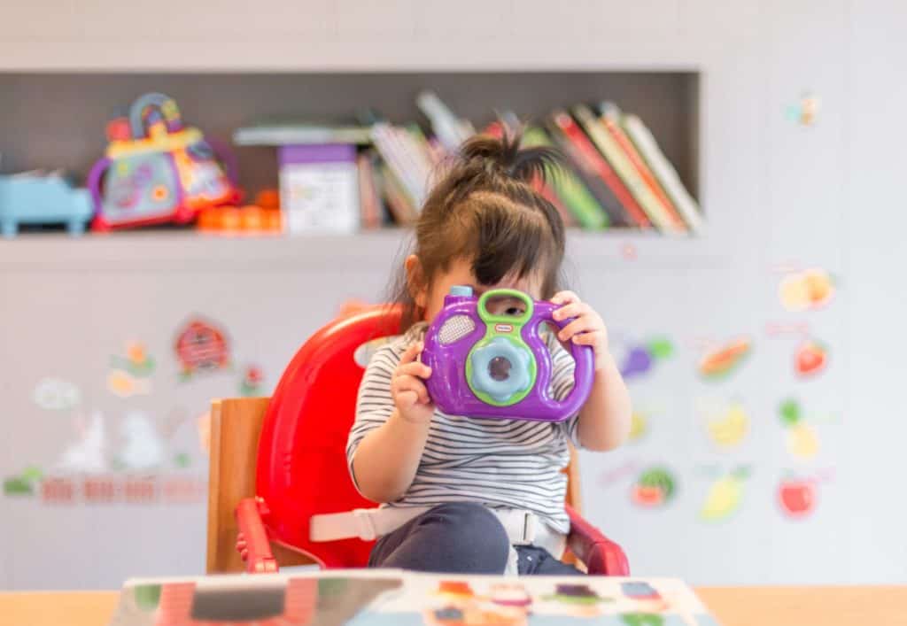 kid on high chair