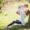 mother holding kid in park